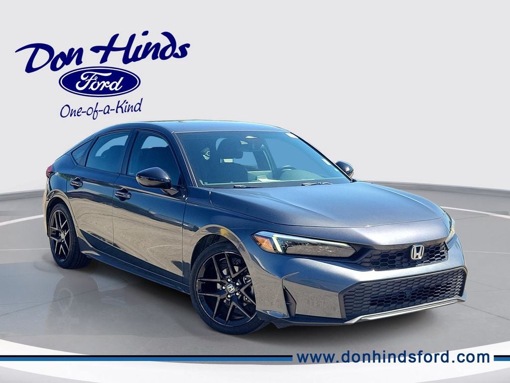 2025 Honda Civic Sport in Blue — front three-quarter view