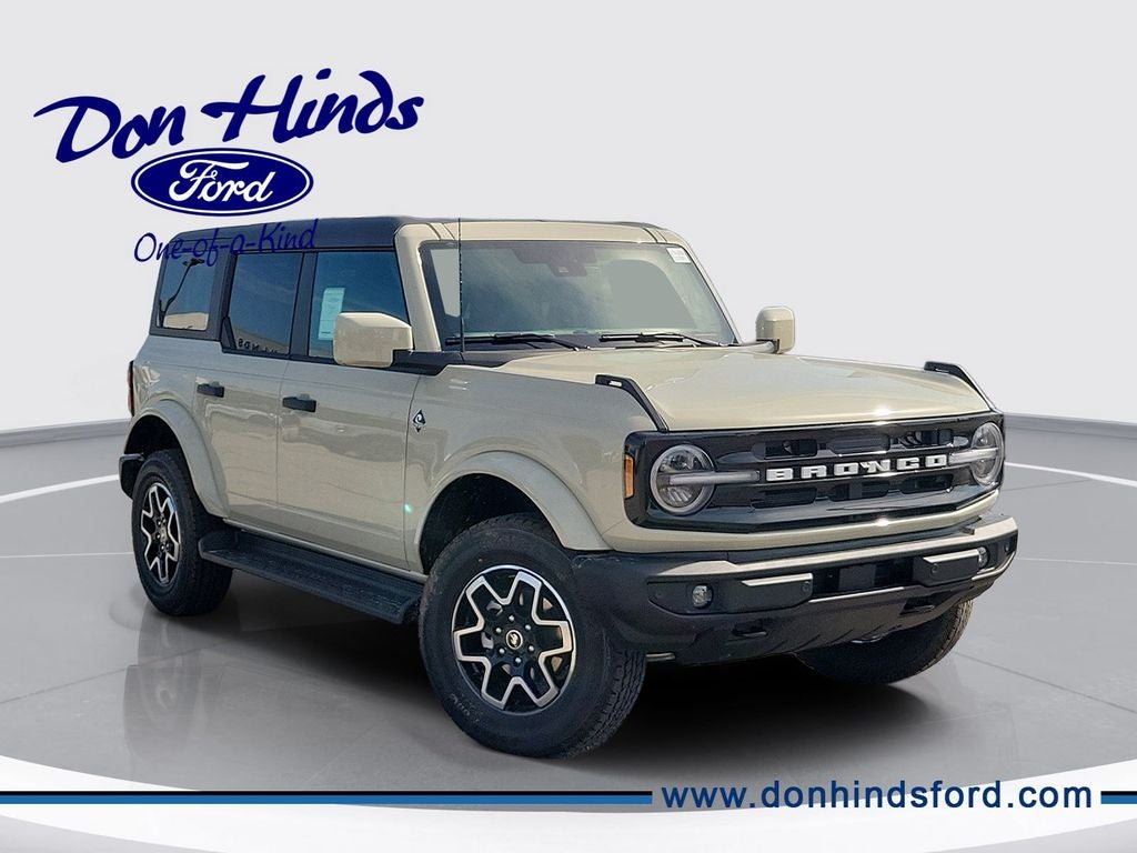 2026 Ford Bronco Outer Banks in Desert Sand — front three-quarter view