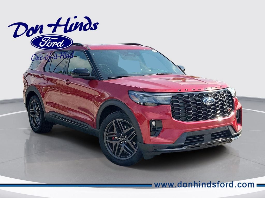 2026 Ford Explorer ST in Rapid Red Metallic Tinted Clearcoat — front three-quarter view