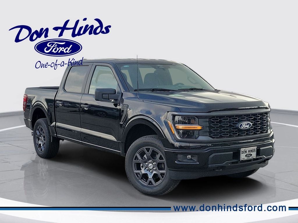 2026 Ford F-150 STX in Black Metallic — front three-quarter view