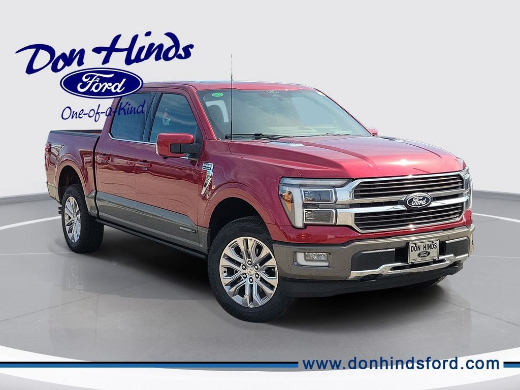 2026 Ford F-150 King Ranch in Ruby Red Metallic Tinted Clearcoat — front three-quarter view